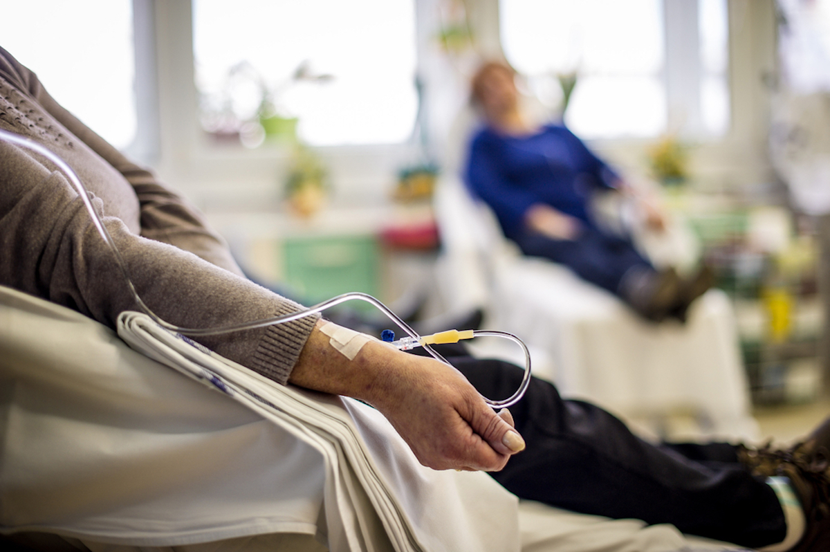 Cancer patients receiving chemotherapy treatment in a hospital.
